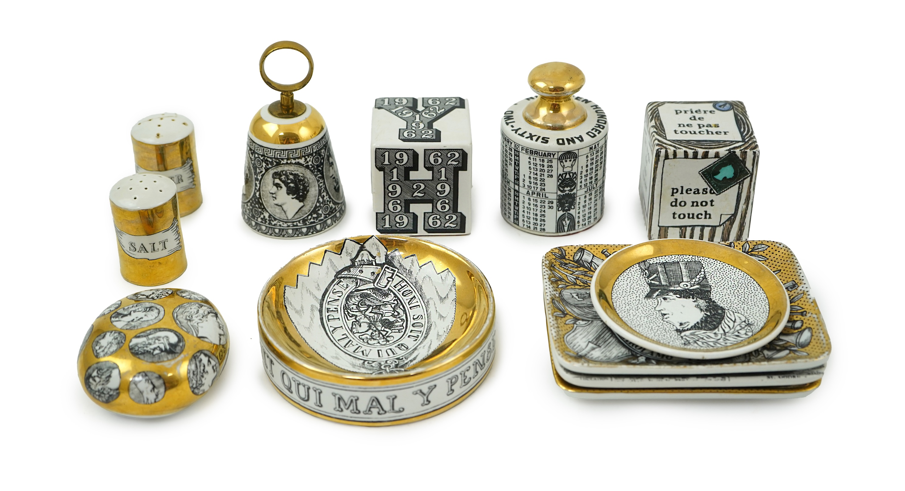 Piero Fornasetti (Italian, 1913-1988): A collection of Fornasetti desk items and dishes